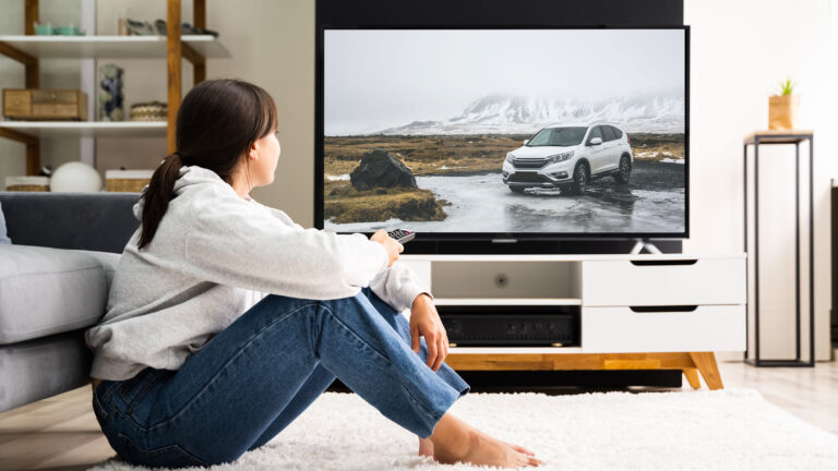 woman watching CTV advertising